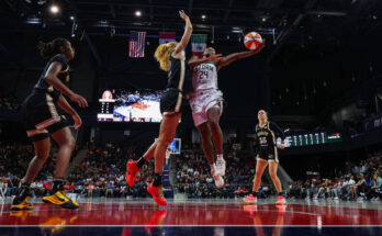 Mystics Shakira Austin defends Storm Jewell Loyd on a layup