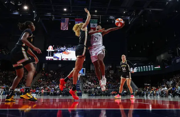 Mystics Shakira Austin defends Storm Jewell Loyd on a layup