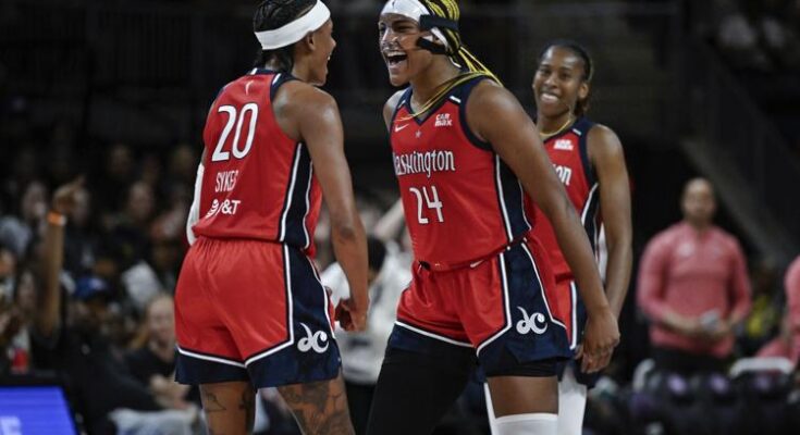 Aaliyah Edwards and Brittney Sykes of the Mystics.